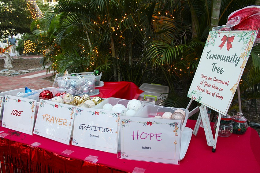 The various colors of ornaments attendees chose to add to the communal tree at Christmas in the Garden represented what they wished for in the new year.