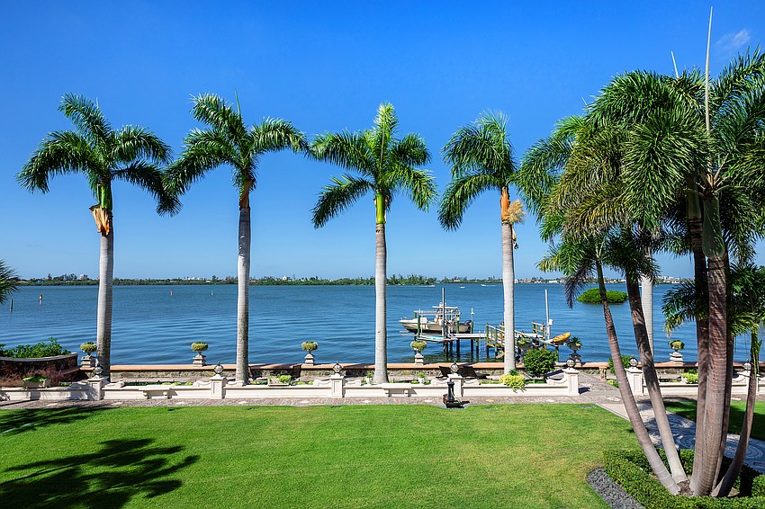The 1.2 acre property offers 146 feet of bayfront.