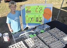 Zac Boone, 6, showcases his crystals.