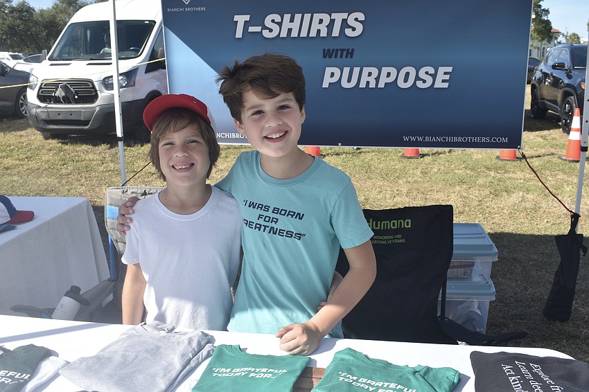 Alessandro Bianchi, 7, and Leonardo Bianchi, 9, operate T-Shirts With Purpose.
