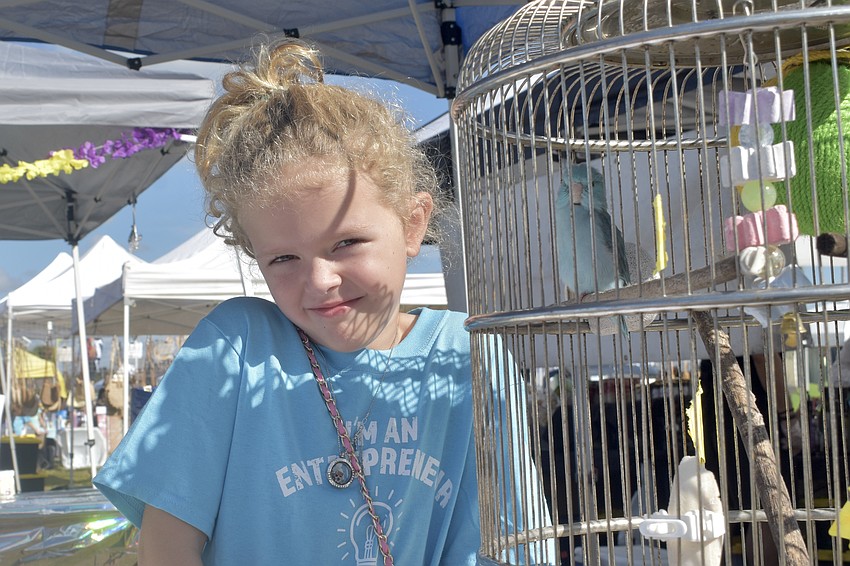 Esther Shultz, 7, sold items to support her bird, Linda.
