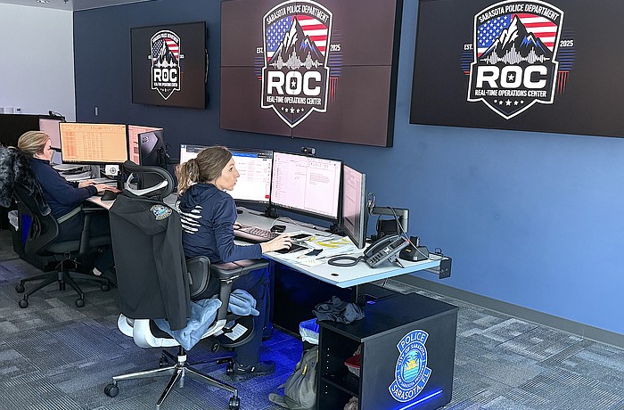 Sarasota Police Department personnel monitor Sarasota's network of cameras, license plate readers, gunshot detectors and other devices in the nearly completed Real-Time Operations Center.