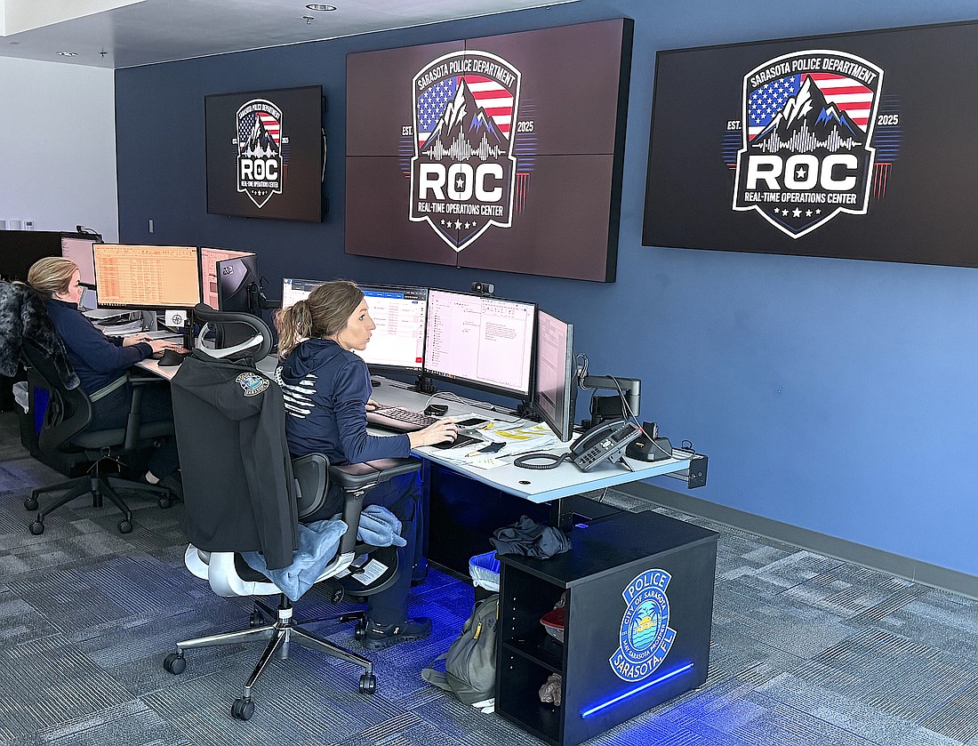 Sarasota Police Department personnel monitor Sarasota's network of cameras, license plate readers, gunshot detectors and other devices in the nearly completed Real-Time Operations Center.