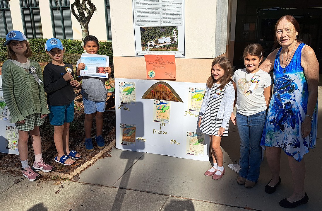 Sea turtle photo coloring contest winners, from left: Emma Gregondy (third place), Landon Ernshaw (second), Maximillian Kajeski (first), Emma McFedden (fourth), Charlie Serrano (fifth) and coordinator Mary Susan Hultay. Courtesy photo