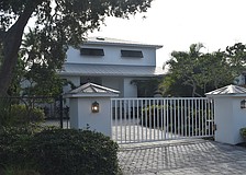 The home at 1718 Bay St. was built in 1997 and has five bedrooms, four
baths, a pool and 4,015 square feet of living area.