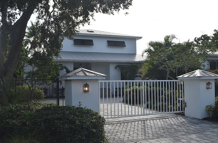 The home at 1718 Bay St. was built in 1997 and has five bedrooms, four
baths, a pool and 4,015 square feet of living area.