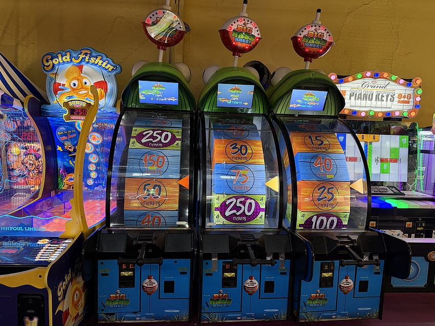 Big Bass Wheel and other games are up for auction at Adventure Landing.