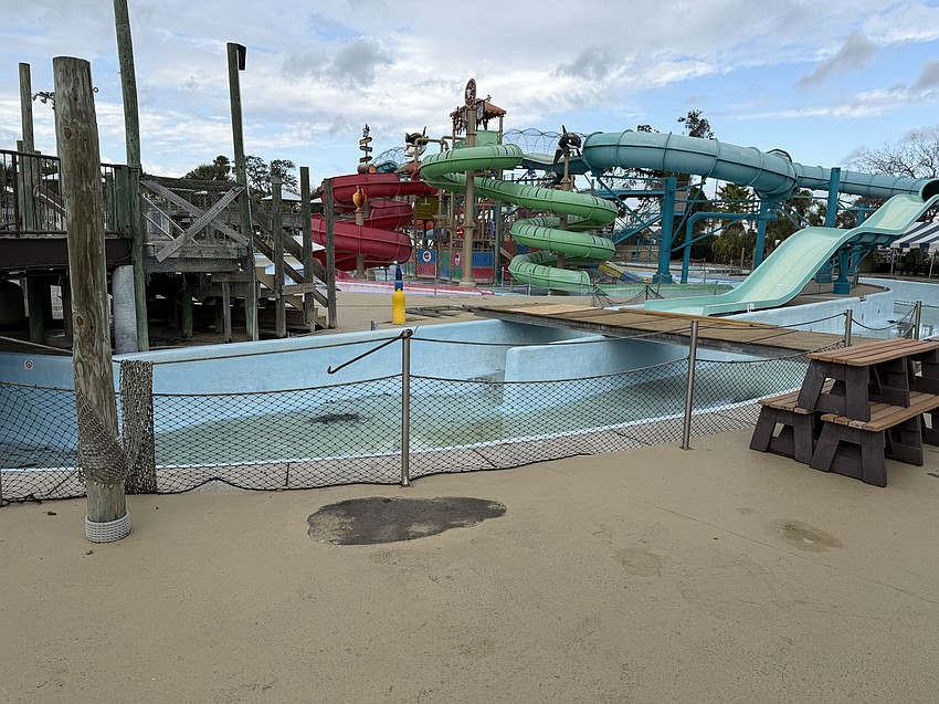 The empty pools look like a skateboarder’s dream, but the gates are locked fences surrounding the property.