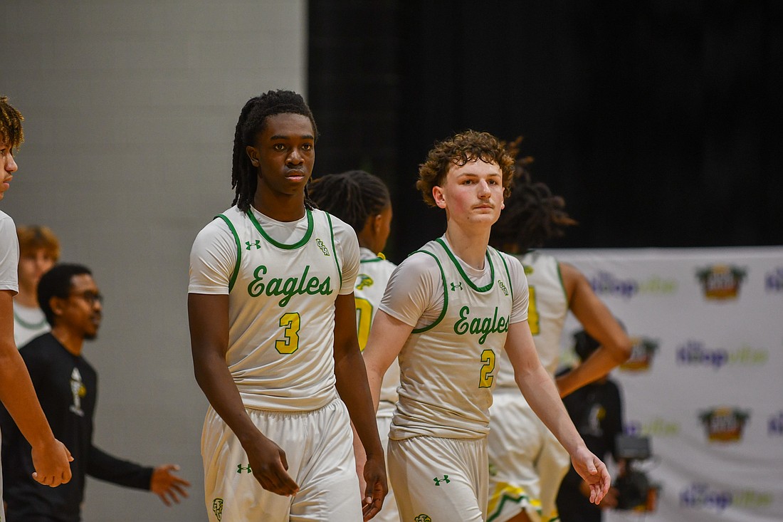 CFCA’s freshman Prince Porterfield and junior Trevor Miller walked on the court after a timeout.