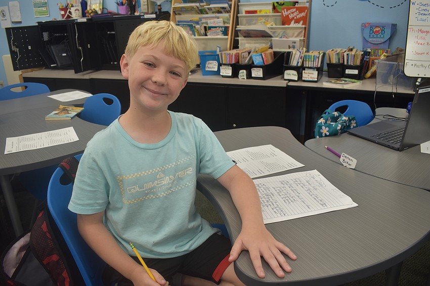 Third grader Declan Baker works on an assignment.