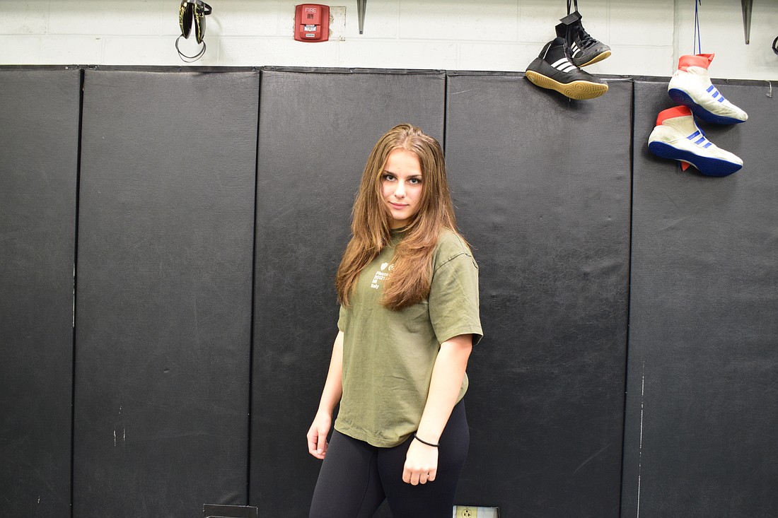 Francesca Bisordi poses for a photo on Dec. 4 during a Lakewood Ranch wrestling practice. Currently competing in the 155-pound weight class, she formerly wrestled at 170 in both 2024 and 2023.