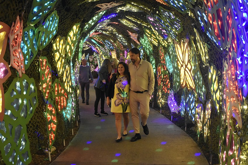 Carey Taylor-Le Prince and Marc Le Prince walk through a tunnel.