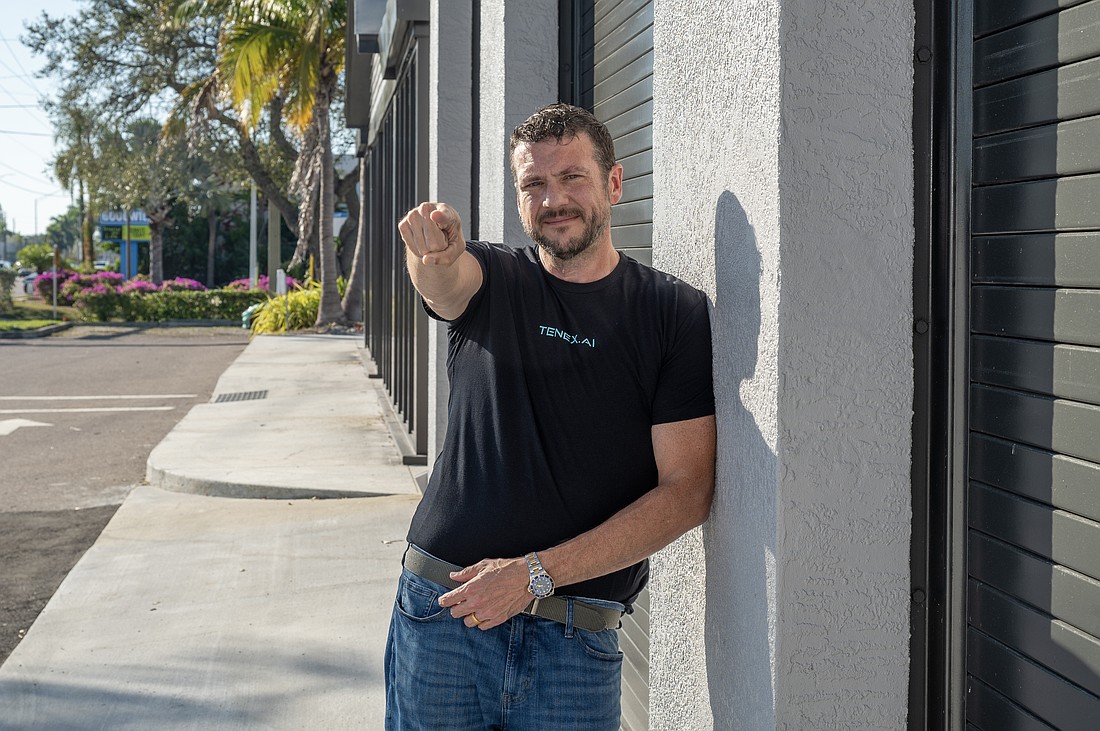 TENEX CEO Eric Foster stands outside the headquarters his company is building on Bee Ridge Road in Sarasota.