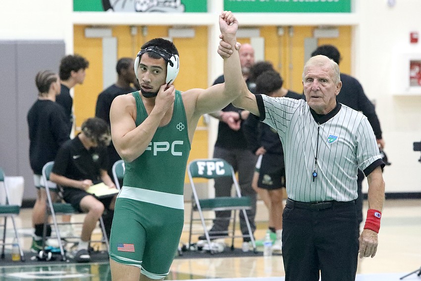 FPC's Gabriel Moy, here winning a season-opening match against Fleming Island at 157 pounds, dropped down to 144 for the regional duals and pinned his Buchholz opponent. File photo by Brent Woronoff