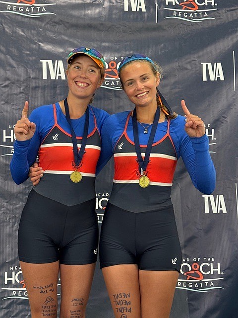 Anna and Maija Andert celebrated rowing themselves to victory in the Head of the Hooch.