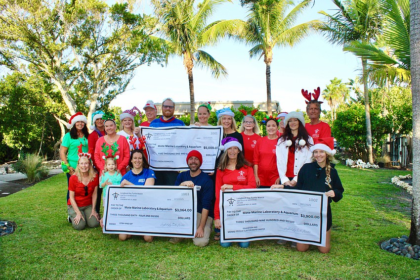 Longboat Key Turtle Watch members donated almost $12,000 on Dec. 5 to Mote Marine for sea turtle rescue, education and protection efforts.