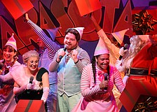 Jolly (Flynn Nolen, center) is surrounded by the other characters including Candy (Christiana Allison), Mrs. Claus (Jillian Hurley), Jangle (Ray Barber), Tinsel (Vanessa Smith), Jingle (Mareece Love) and Santa Claus (Dellan Short).