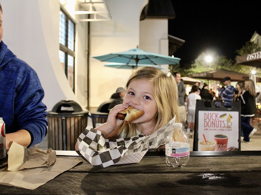 Lakewood Ranch 4-year-old Mikayla Barclay chows down on a hot dog.