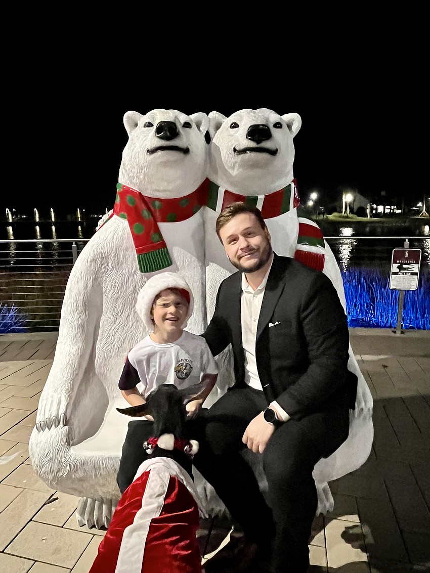 East County's Griffin and Joshua Day stop by to see the goats after yoga class wraps.