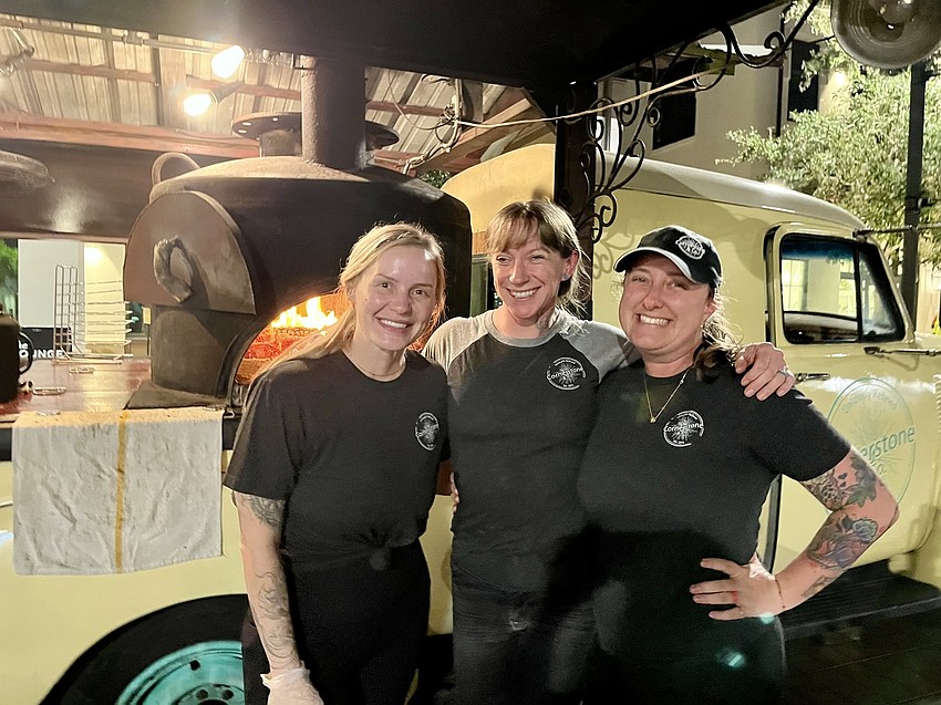 Alissa Osmolinski, owner Shannon Illch and Megan Vogler sell out of pizzas. The Cornerstone and Company truck can only hold dough for 110 pies.