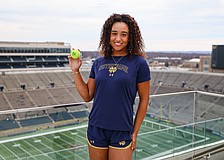 Gabriella Rawles holds a Fighting Irish tennis ball and poses for a photo at Notre Dame Stadium. The senior at ICL Academy online is headed to South Bend, Indiana, in January as an early enrollee.
