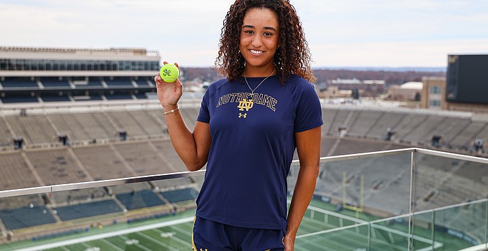 Gabriella Rawles holds a Fighting Irish tennis ball and poses for a photo at Notre Dame Stadium. The senior at ICL Academy online is headed to South Bend, Indiana, in January as an early enrollee.