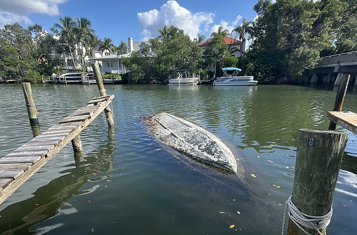 Sarasota Police on Monday recovered a sunken, capsized boat from Hudson Bayou that had been swamped for more than three years.