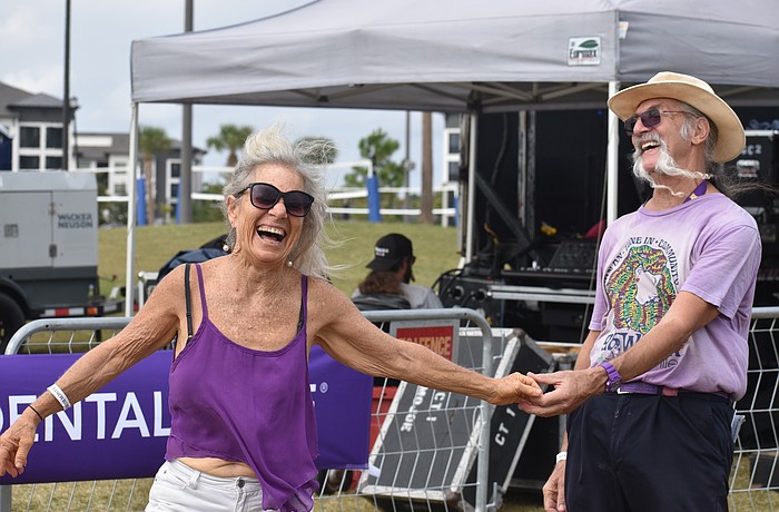 St. Petersburg's Ella Brown and Sarasota's Mike Chambers take full advantage of the live music to show off their best dance moves at the Lakewood Ranch Blues Fest Dec. 6.