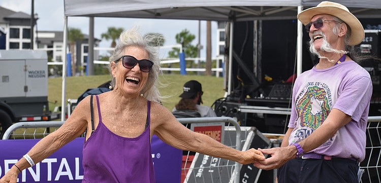 St. Petersburg's Ella Brown and Sarasota's Mike Chambers take full advantage of the live music to show off their best dance moves at the Lakewood Ranch Blues Fest Dec. 6.