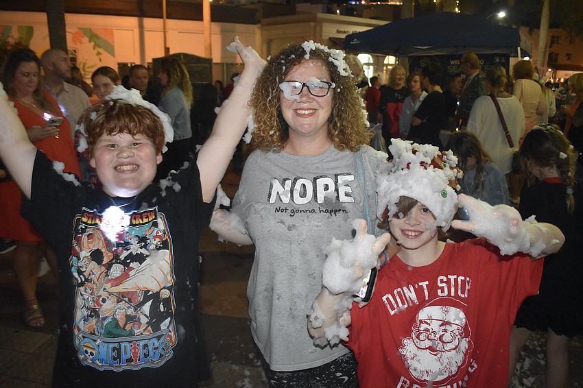 Joshua Fortney, 10, Kelley Fortney and Wyatt Fortney, 10, enjoyed pplaying in the snow.