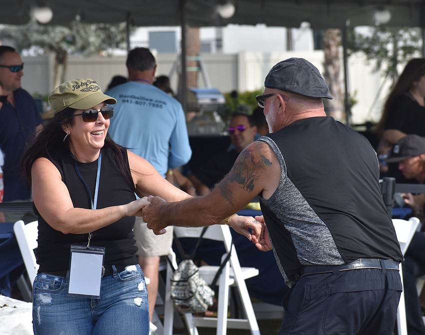 Sarasota's Kim Morton says the atmosphere are the blues festival inspired her to let loose and dance with Arcadia's Craig Brogan.