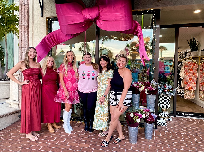 Local St. Armands Circle shops joined in the holiday fun of the tree-lighting celebration on Dec. 5. Monkee's Sarasota hosted a pop-up event with Missy Fashion Accessories, Studio Bustan floral design, and James and Jolie Permanent Jewelry.