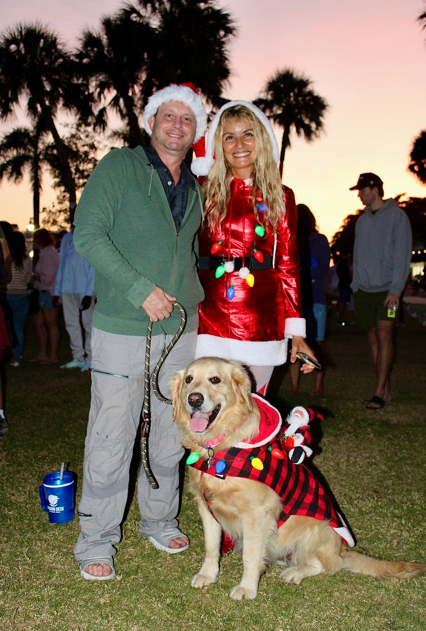 Jesse, Marianna and Phoebe Corazza take in the festive sights at the Dec. 5 Christmas tree lighting on St. Armands Circle.
