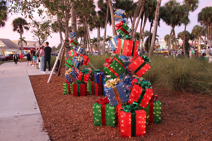 Festive decorations surrounded St. Armands Circle Park for the tree-lighting ceremony.