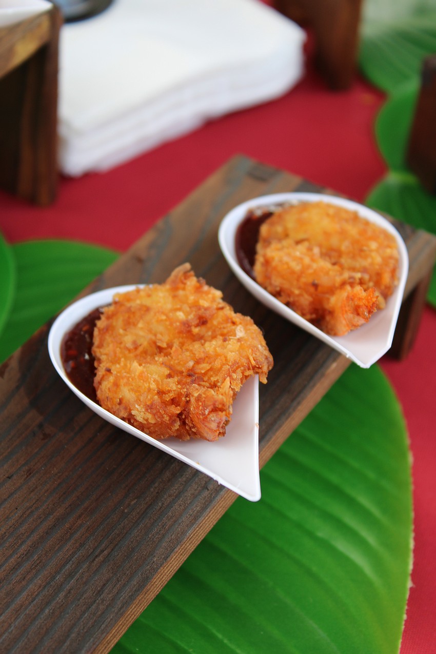 The Old Salty Dog's coconut shrimp with jalapeño raspberry sauce was a hit at the Lawn Party. The City Island location plans to welcome Santa Claus for a morning visit Dec. 13 and invites community members to join.