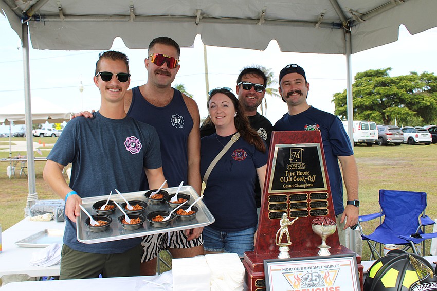 Longboat Fire Rescue recreated its award-winning chili from the annual Morton's Firehouse Chili Cook-Off for this year's Lawn Party. From left, Trey Bowlin, Zach Schield, Abby Kolesa, Brian Kolesa and Tyler Brunton.
