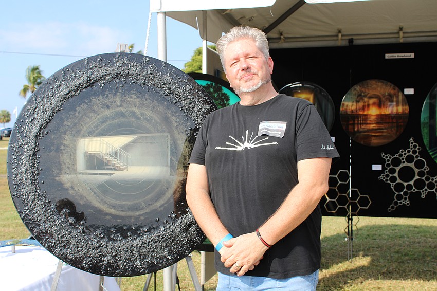 Local artist Collin Rowland presents his three-dimensional works at the Lawn Party.