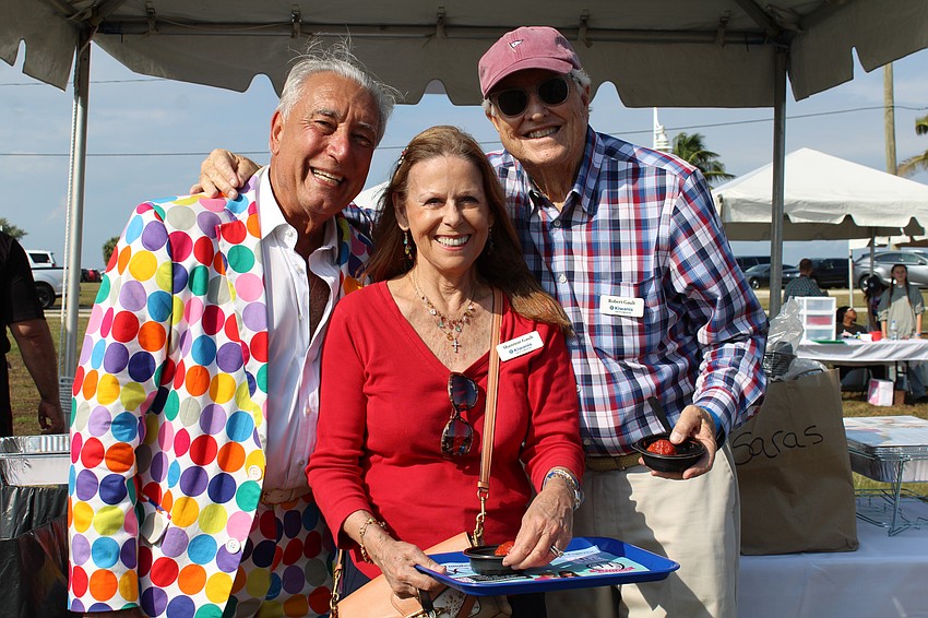 Andrew Vac and Shannon and Robert Gault attend the Lawn Party.