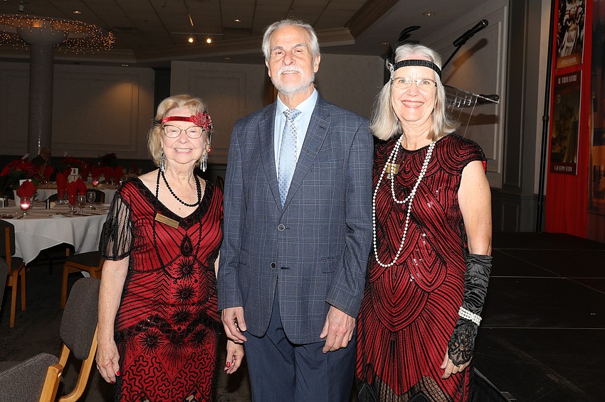 Sarasota Opera Guild President Sherry Wheeler, Maestro Victor DeRenzi and Guild VP Ina Goldberg