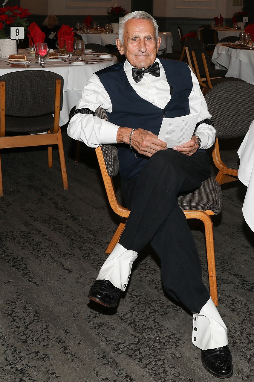 Michael Santo shopped a little Goodwill, a little Amazon and completed his attire with Great Gatsby spats.