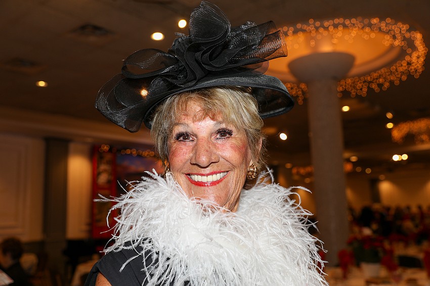 Terry Brennan Davis wears a Great Gatsby-inspired hat in line with the event's theme.