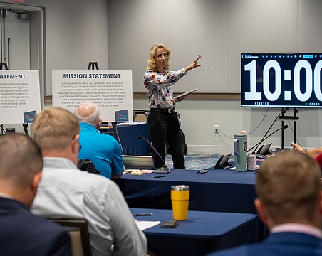Director of Government Relations Stephanie Garrison leads the work session Dec. 3.