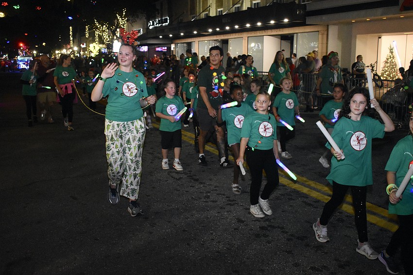 Miss Jodi's School of Dance makes its way along Main Street.