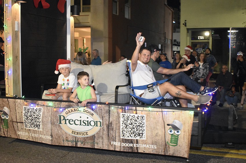 Precision Garage Door Service heads down Main Street.