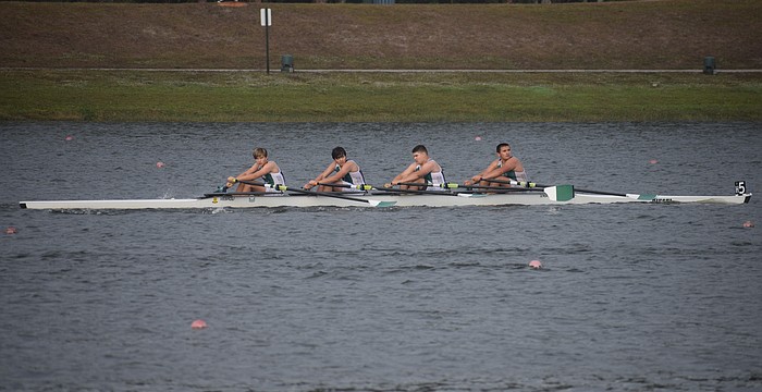 Four boys compete for Sarasota Scullers in the Plant High Winter Sprints on Dec. 6 at Nathan Benderson Park. The Scullers, founded in 1991, are hosting a fundraiser on Dec. 13 to build back from damages suffered during past hurricane seasons.
