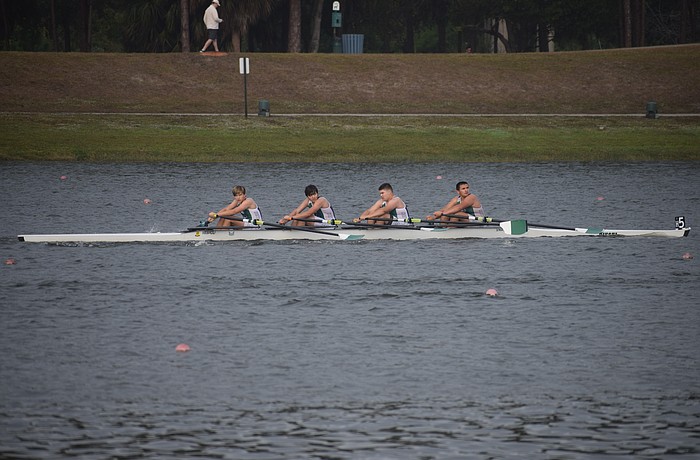 Four boys compete for Sarasota Scullers in the Plant High Winter Sprints on Dec. 6 at Nathan Benderson Park. The Scullers, founded in 1991, are hosting a fundraiser on Dec. 13 to build back from damages suffered during past hurricane seasons.