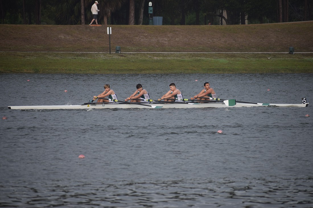 Four boys compete for Sarasota Scullers in the Plant High Winter Sprints on Dec. 6 at Nathan Benderson Park. The Scullers, founded in 1991, are hosting a fundraiser on Dec. 13 to build back from damages suffered during past hurricane seasons.