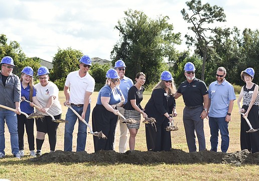 Harbor58 volunteers and Manatee County commissioners put the first shovels in the ground Nov. 17.