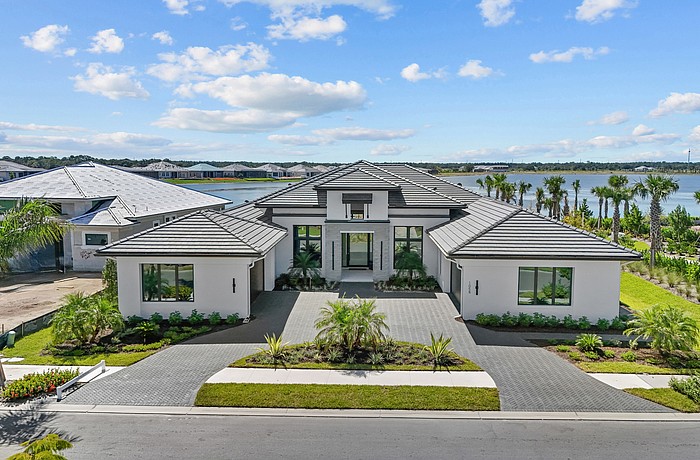 A Wild Blue at Waterside home at 1058 Blue Shell Loop sold for $3.25 million. Built in 2025, it has five bedrooms, five-and-a-half baths, a pool and 4,607 square feet of living area.