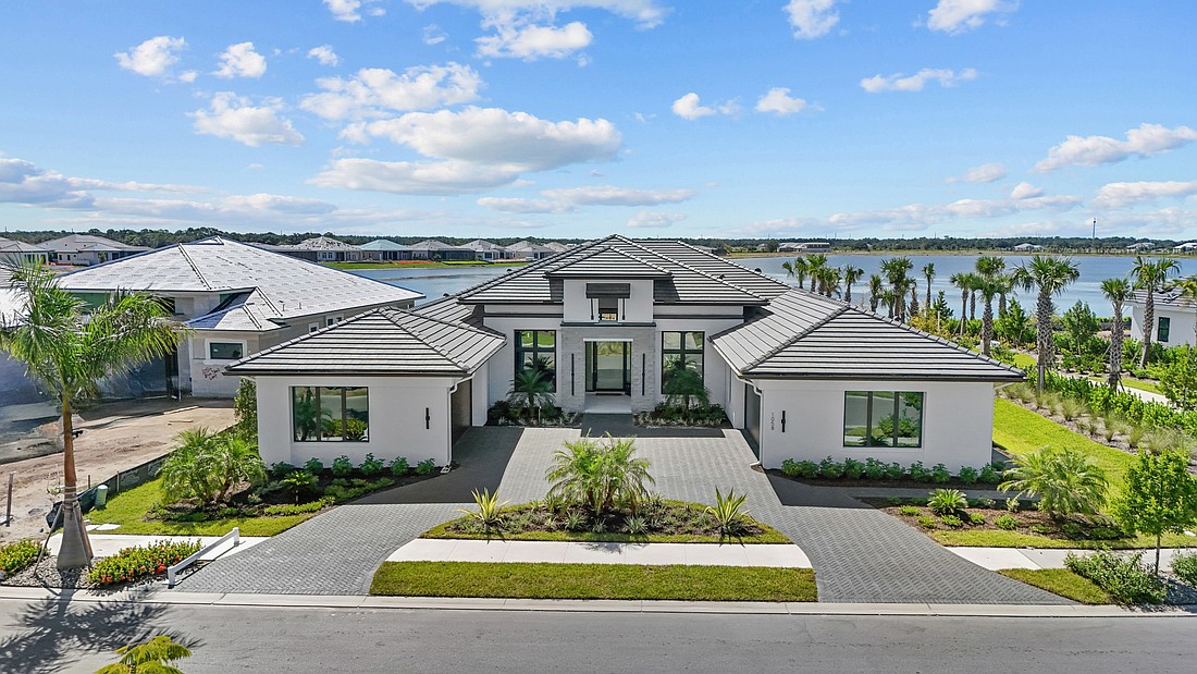 A Wild Blue at Waterside home at 1058 Blue Shell Loop sold for $3.25 million. Built in 2025, it has five bedrooms, five-and-a-half baths, a pool and 4,607 square feet of living area.